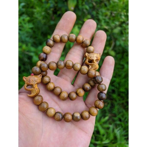 Vòng tay nữ hạt tròn 8li charm mix hồ ly gỗ thơm bach màu tự nhiên