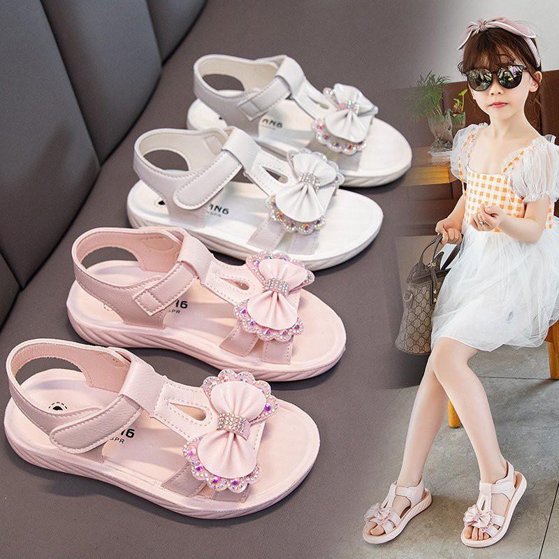 Sandal Bé Gái 2-13 Tuổi Quai Ngang Siêu Nhẹ Đế Êm Chống Trơn Trượt Gắn Nơ Đính Đá Phong Cách Hàn Quốc D36