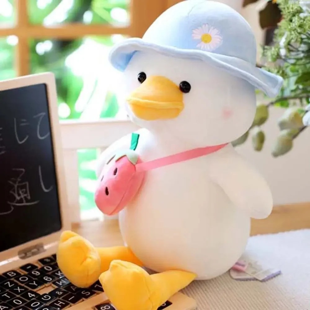 Thú nhồi bông vịt đeo túi đáng yêu - Size 22cm - Quà tặng gấu bông vịt đội nón êm mịn