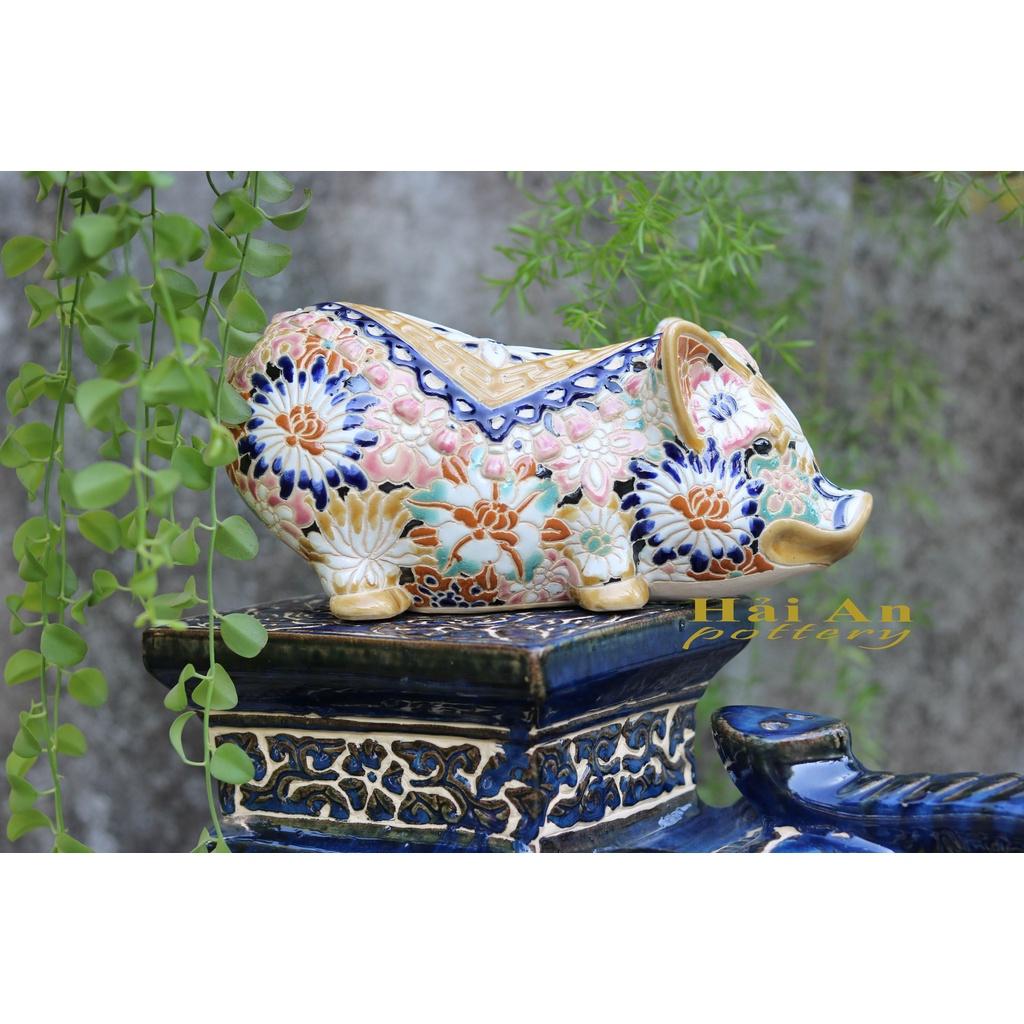 Heo gốm khắc bách hoa