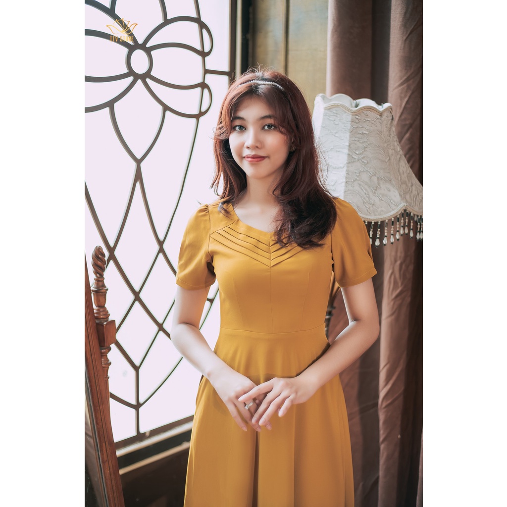 Đầm xòe trung niên TTV Store TTV1207 thiết kế cổ tim xếp li tay ngắn màu Vàng nghệ đi tiệc thanh lịch
