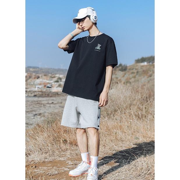 Áo thun nam tay lỡ Triumphal cotton phông unisex phong cách ulzzang hình in phát quang