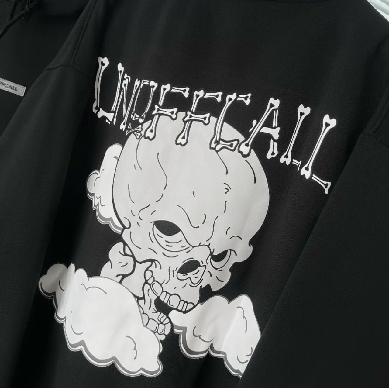Áo khoác hoodie nỉ bông dày dặn tag UNOFFCALL đầu lâu 3 túi màu đen form rộng unisex nam nữ, áo hoodie cặp đôi