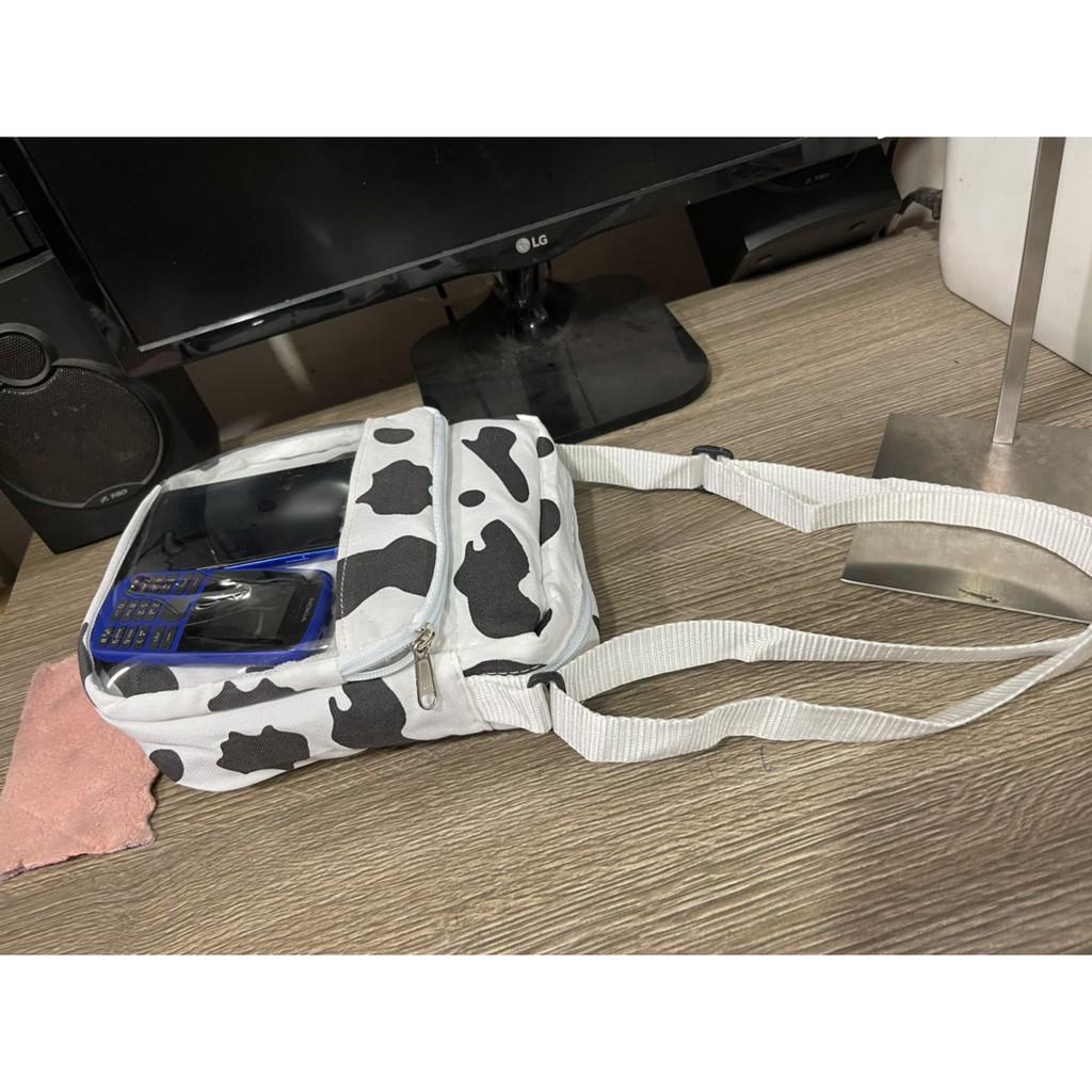 TÚI ĐEO CHÉO NAM NỮ HỌA TIẾT BÒ SỮA