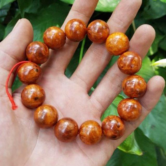 Vòng tay nam gỗ nu huyết long hạt tròn 16 m m