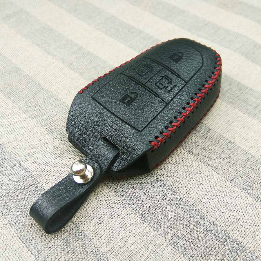 Bao da 4 nút chìa khóa smartkey cho xe hơi Peugeot Traveller (Đen)