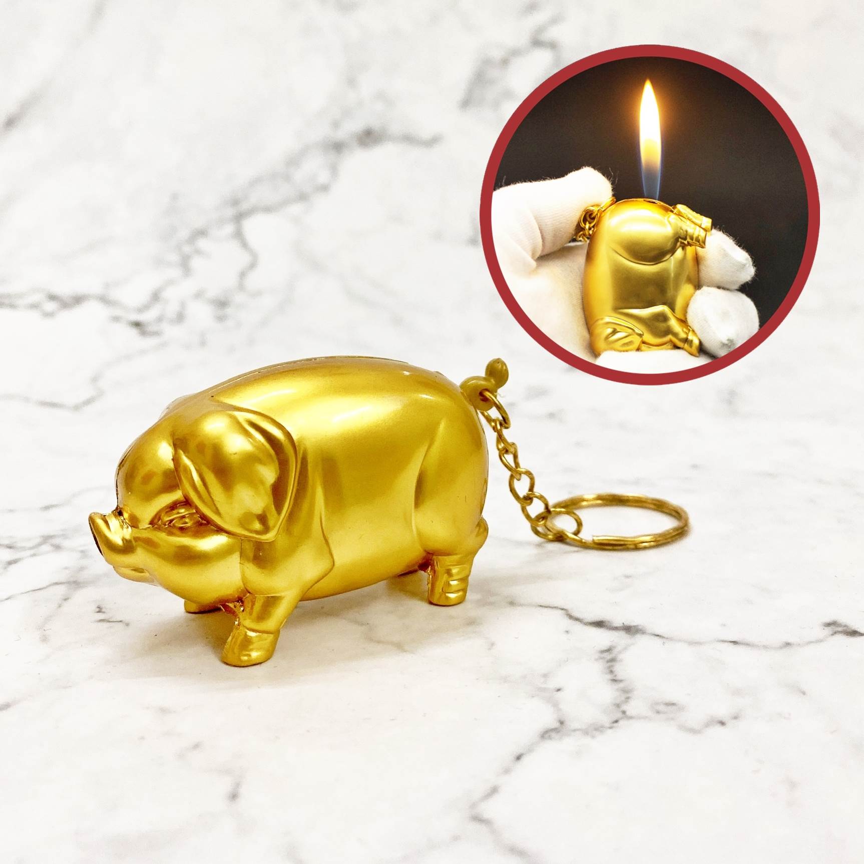 Hột quẹt bật lửa móc khóa hình con heo vàng -