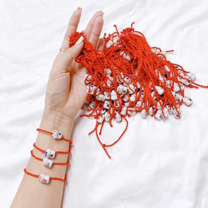 Vòng đeo tay chỉ đỏ mèo thần tài may mắn giá cực sốc