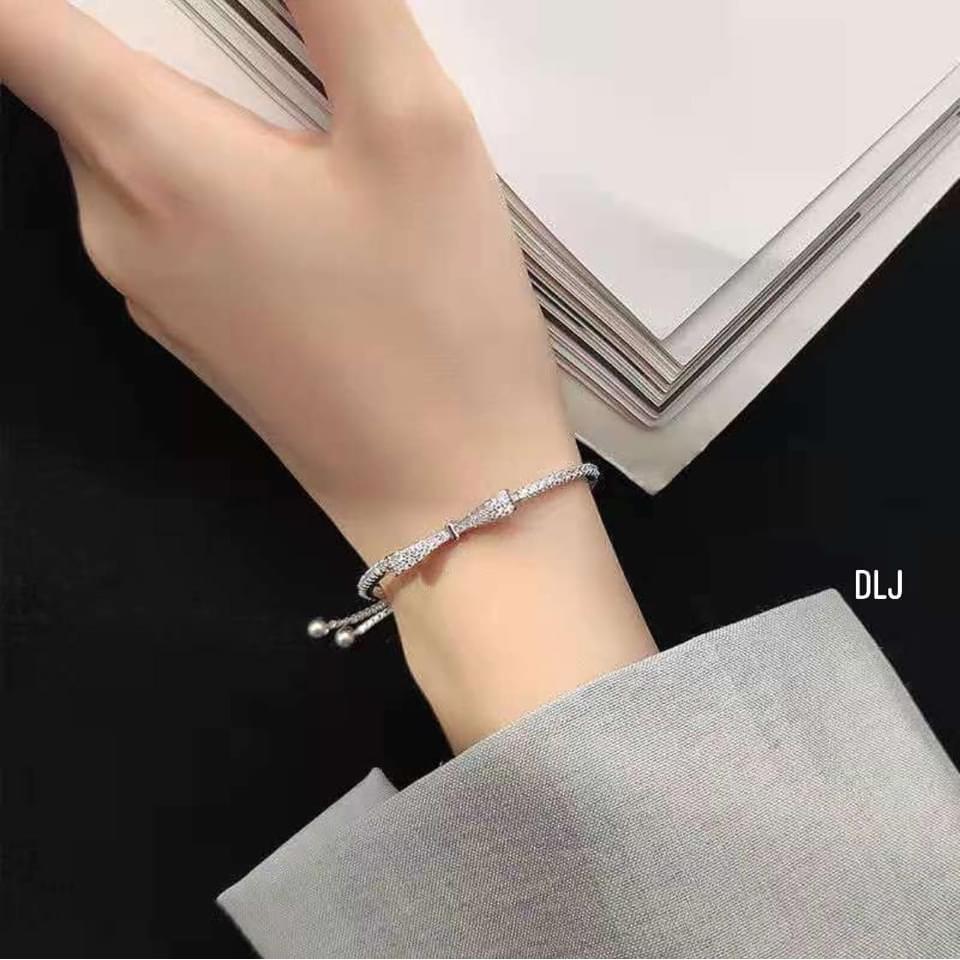 Lắc tay bạc nơ rút gắn đá trắng nhân tạo,vòng tay nơ bạc đẹp