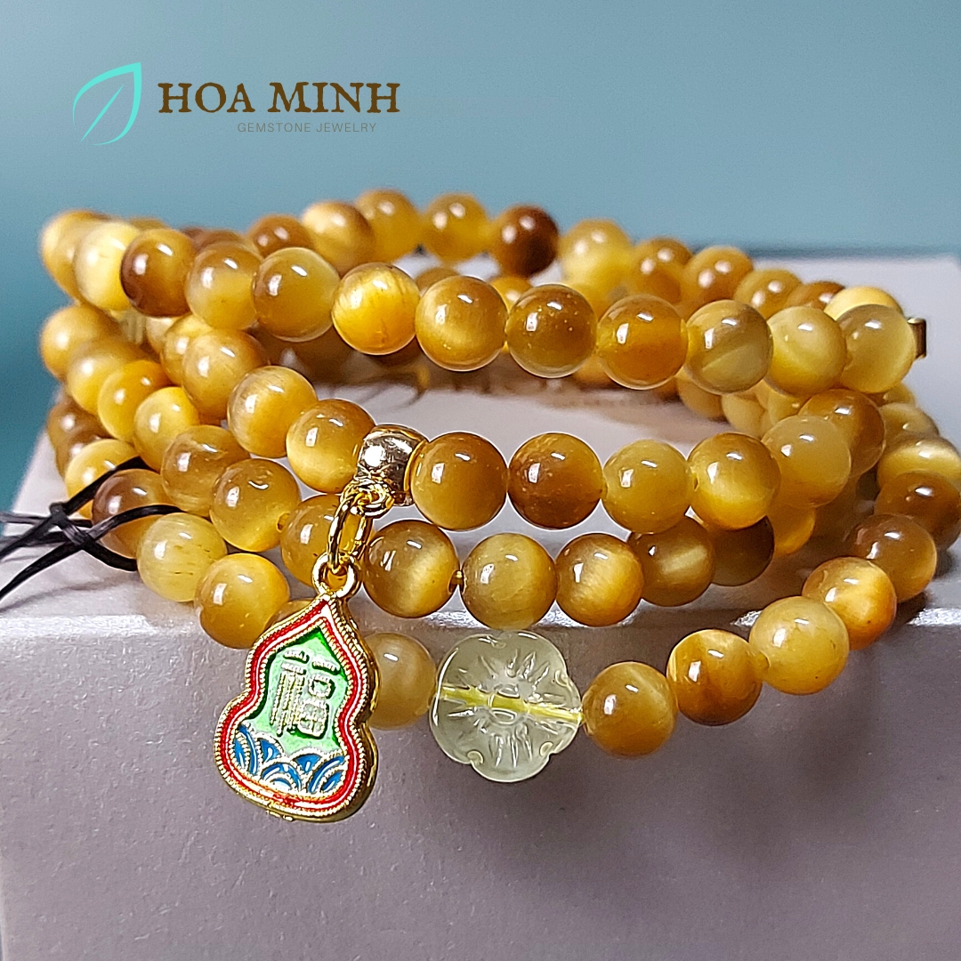 Vòng tay chuỗi Mắt Hổ Vàng Tâm 108 hạt size 6 li An Lạc, phối charm ngôi sao, hoa mai và hồ lô chữ Phúc | Hoa Minh Gem