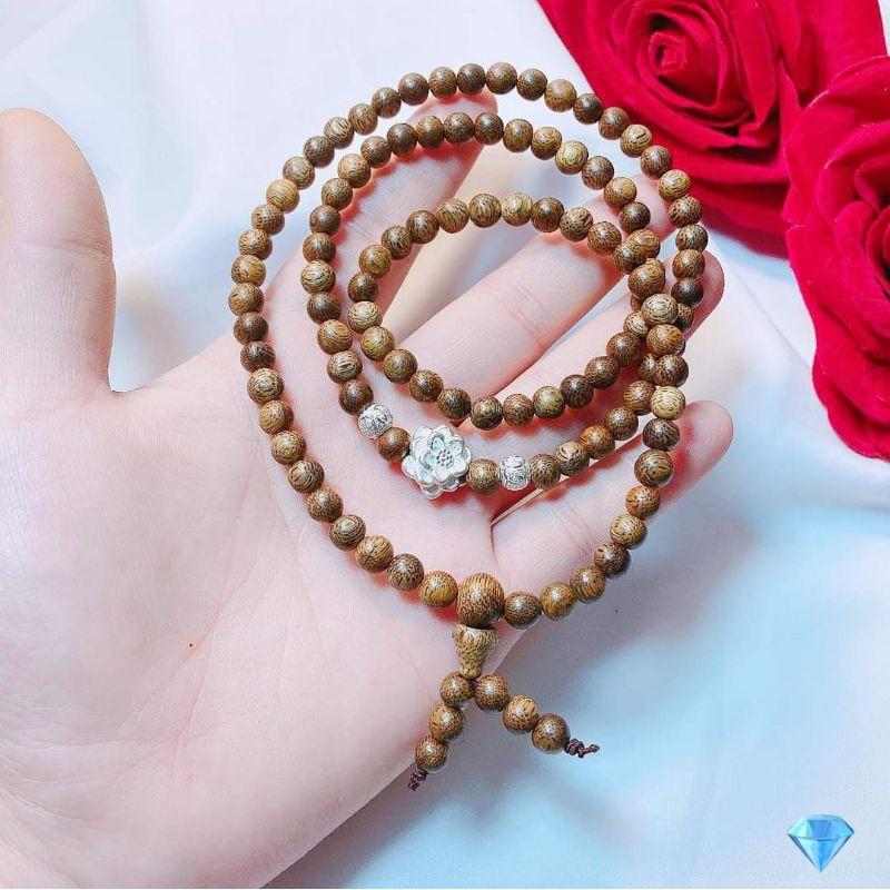 VÒNG TAY TRẦM HƯƠNG MIX HOA SEN BI BẠC