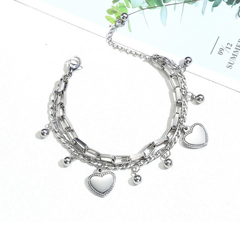 Lắc Tay Nữ Dây Xích Tòn Ten Titan Ko Đen TT 2497
