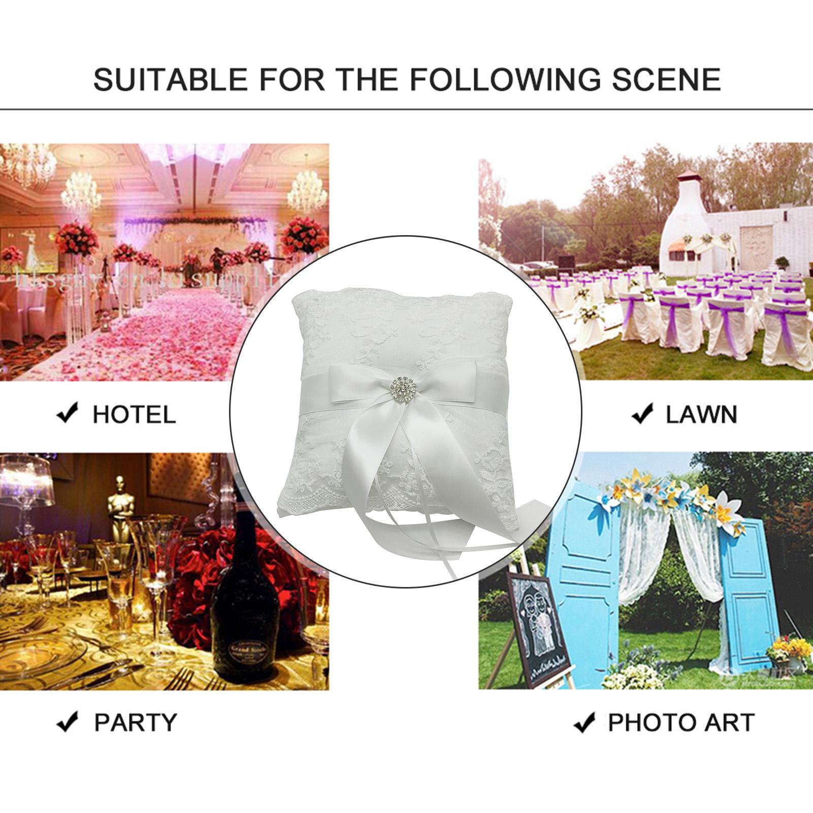 Gối nhẫn cưới mang vòng sa tanh trắng với nơ ruy băng, trang trí pha lê và ren