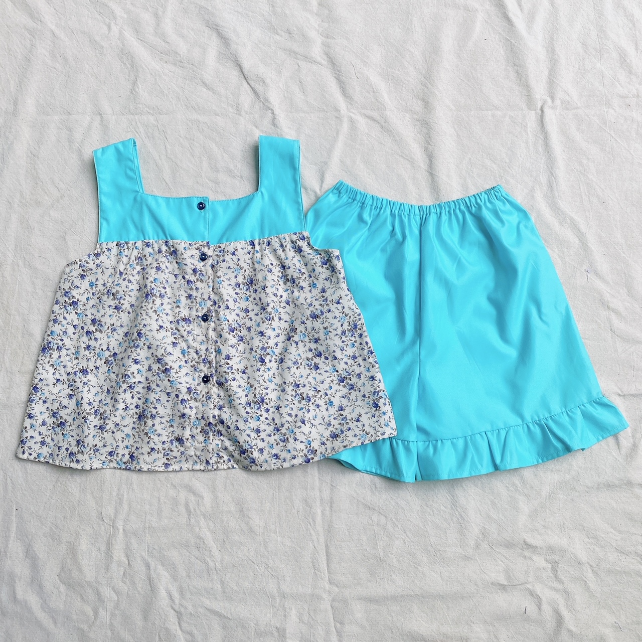 Bộ ngắn bé gái ráp vải hoa nhí xanh dương size 13-45kg