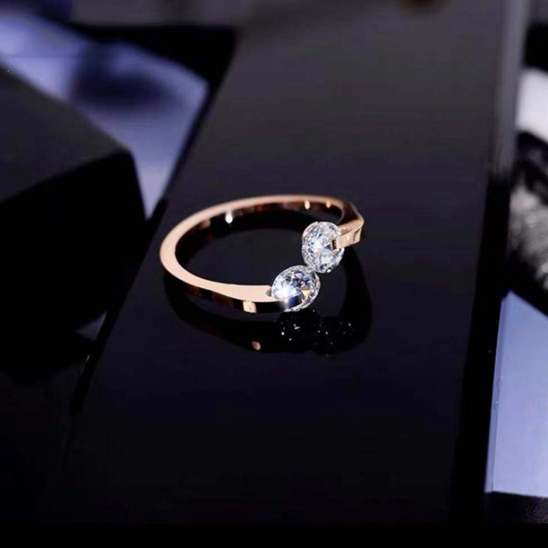 Nhẫn Hở 2 Viên Đá Titan Không Đen TT 2452