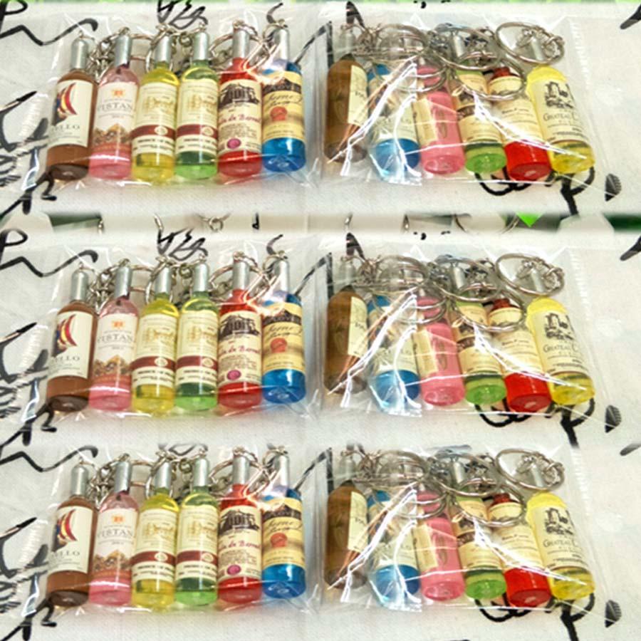 MÓC KHÓA CHAI RƯỢU bán lỗ