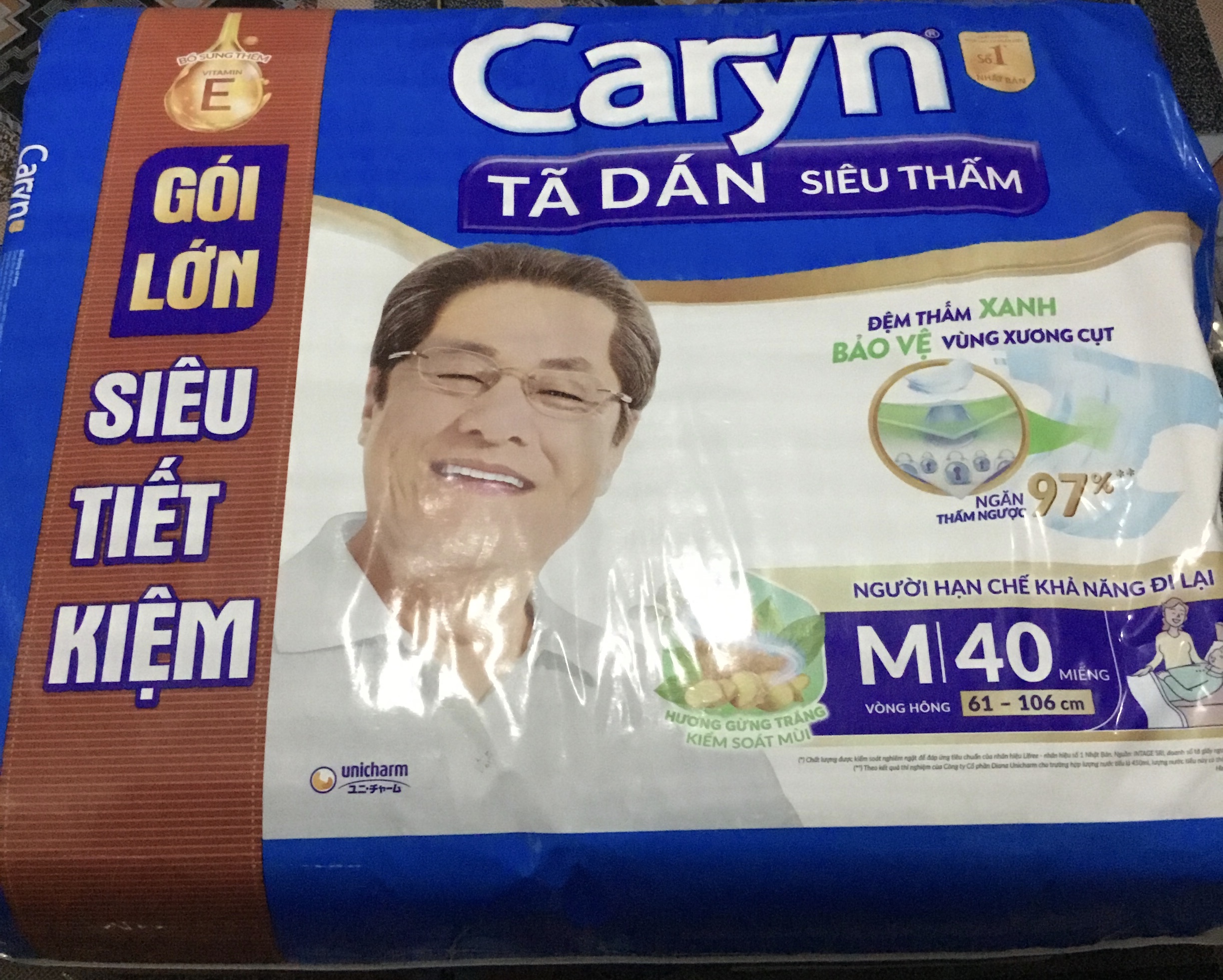 Mẫu mới- Tã dán Caryn M40 Siêu thấm Đệm thấm xanh bảo vệ vùng xương cụt - Date mới