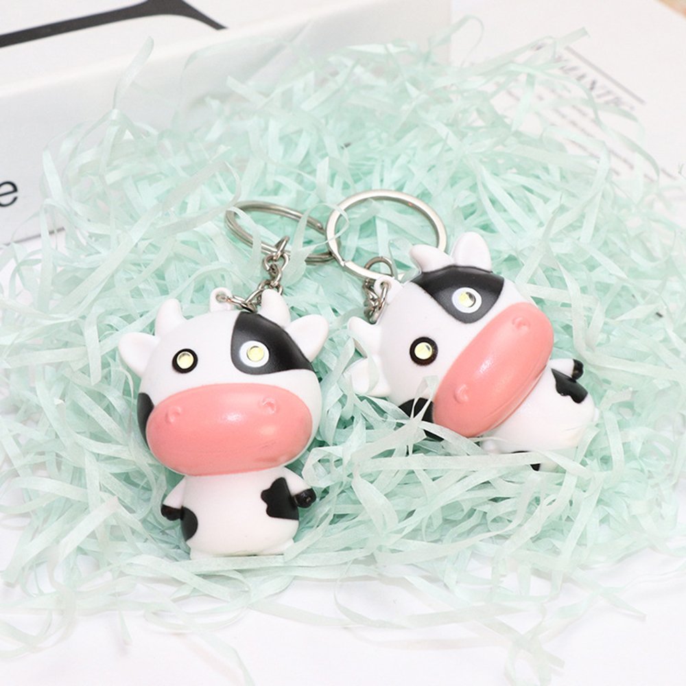 Móc khóa con bò sữa cute mắt có đèn phát sáng, phát ra tiếng kêu ngộ nghĩnh