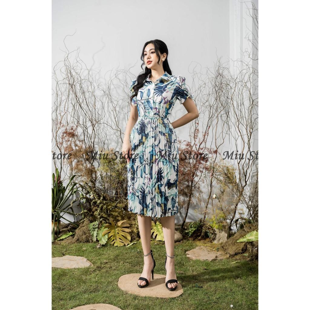 Đầm công sở thiết kế phối hoa dập ly eo thun