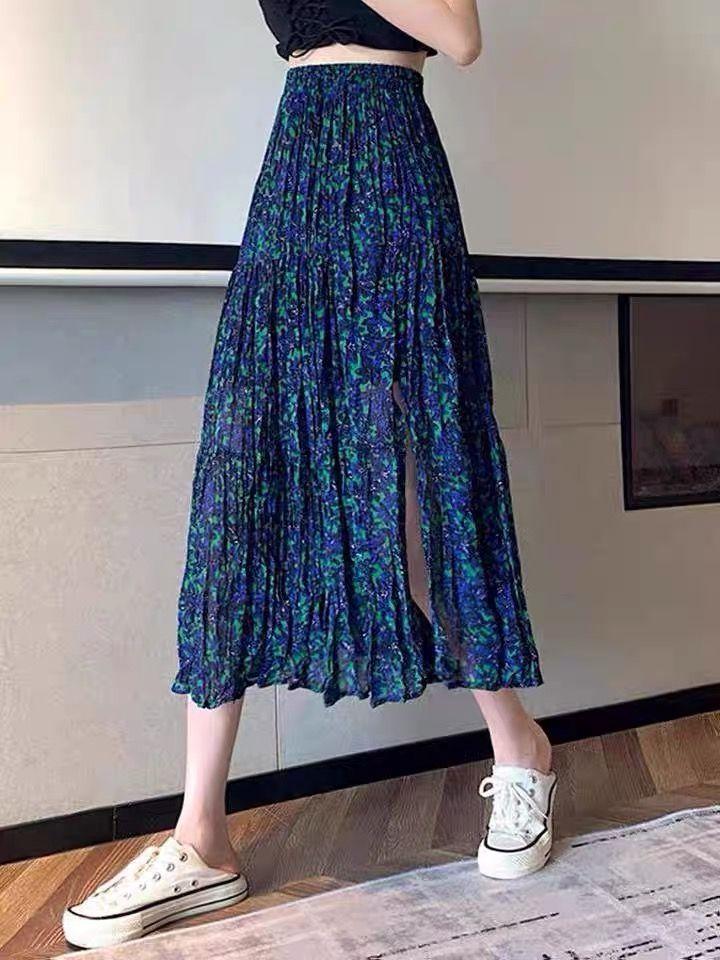 DONGSHOP Cao cấp hoa xẻ tà nửa người váy mùa xuân và mùa hè 2023 Vintage thả cảm thấy gầy váy xếp li một chữ dài váy