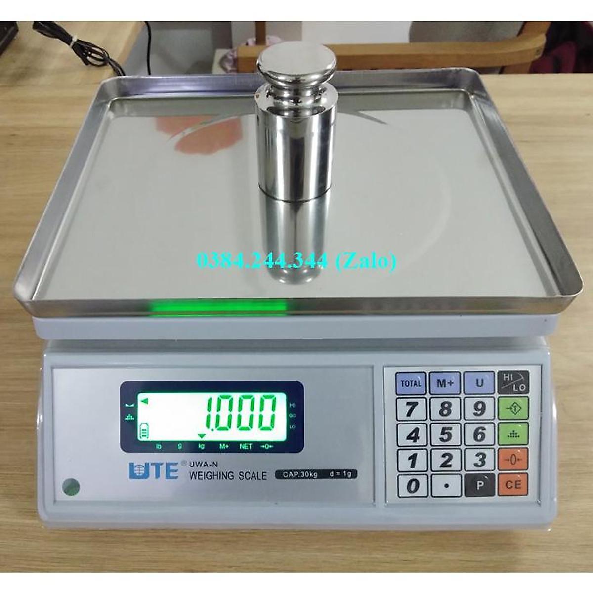 Bộ sản phẩm in tem phiếu khối lượng gồm cân điện tử thông dụng UTE UWA-N mức cân 15kg, độ chia 0.5g và máy in LP50
