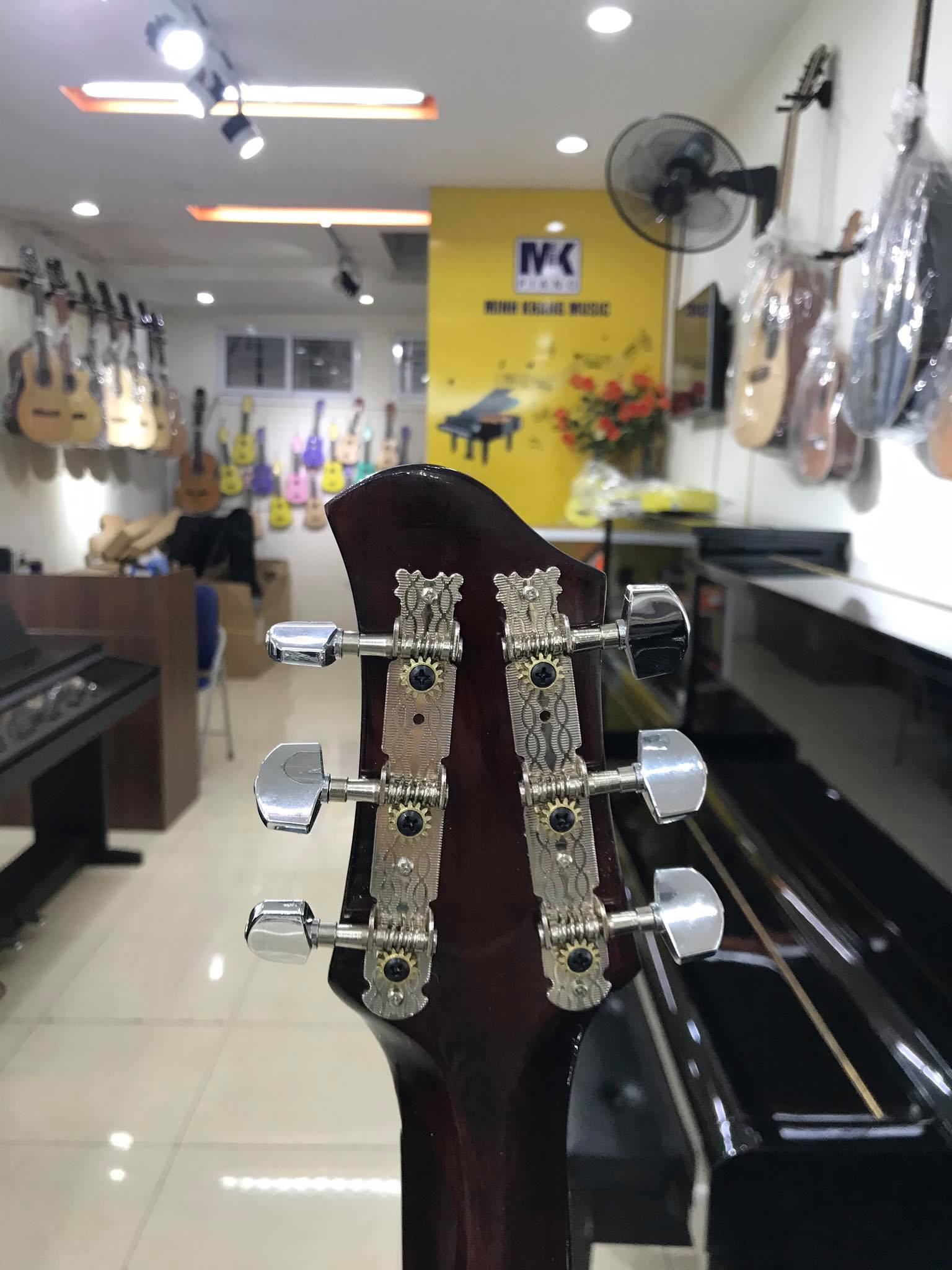 Đàn guitar Acoustic MKAC950, thùng eo, màu vân gỗ, Việt Nam, bao da 2 lớp, bộ dây dự phòng