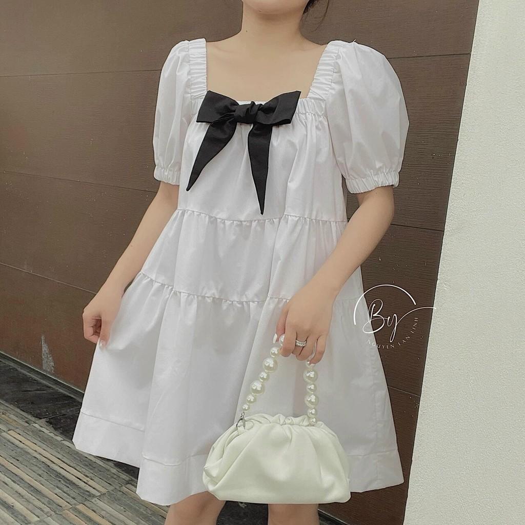 Váy đầm nữ dáng babydoll màu trắng cột nơ cổ tay bồng nữ tính