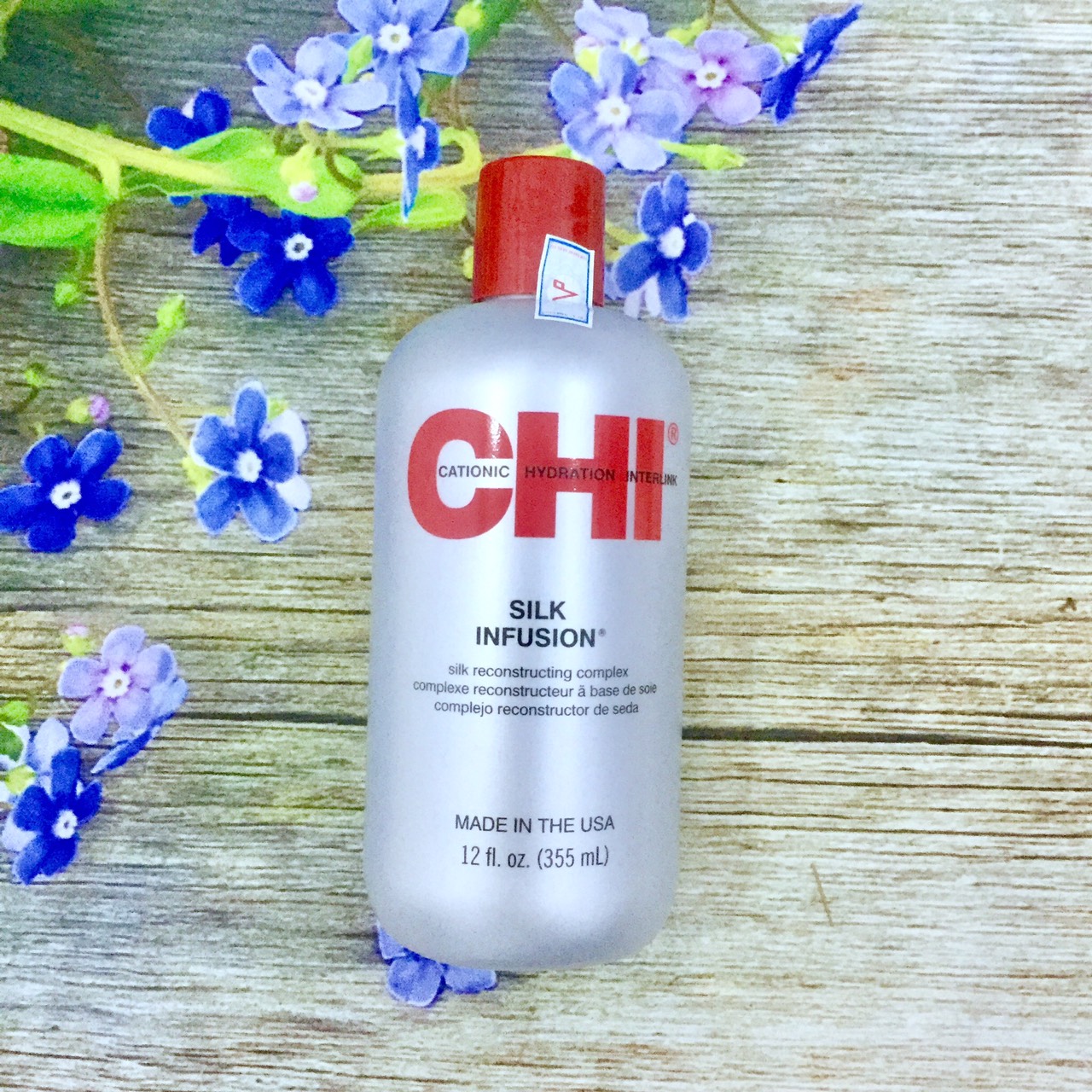 [+Tặng mũ trùm] Tinh dầu dưỡng tóc CHI Silk Infusion Silk Rescontructing Complex 355ml