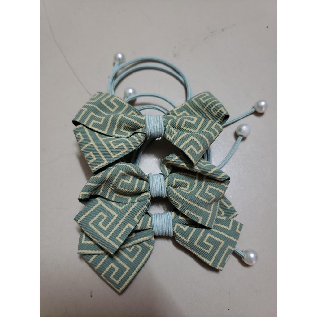 Dây cột tóc nơ dễ thương,nhiều màu cho các nàng chọ lựa