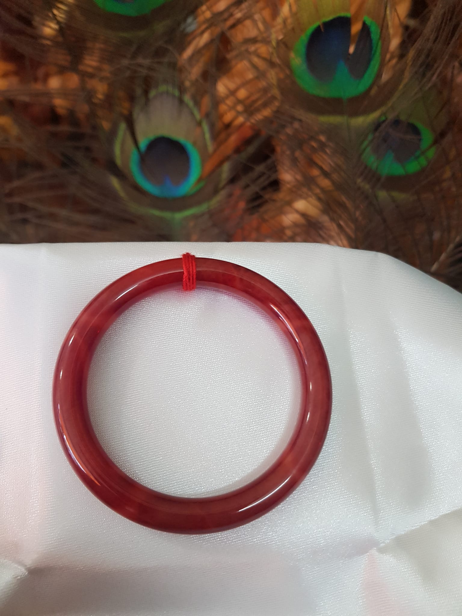 Vòng Nữ đá cẩm thạch Đỏ Đẹp 50mm x cọng 7,2mn Màu đỏ đậm vân vân đậm nhạt đều đẹp Nữ mệnh Hỏa Thổ 49kg - 54kg ạ