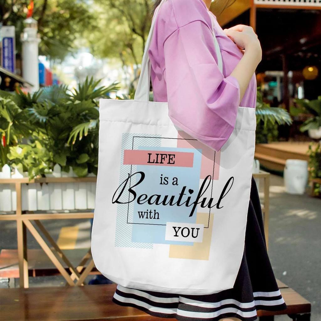 Túi tote trắng họa tiết mới believe và beautiful đẹp dã man luôn ạ