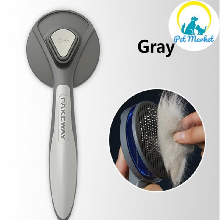 Lược chải lông cao cấp PAKEWAY T9 cho chó mèo. Có nút bấm đẩy lông xịn xò.