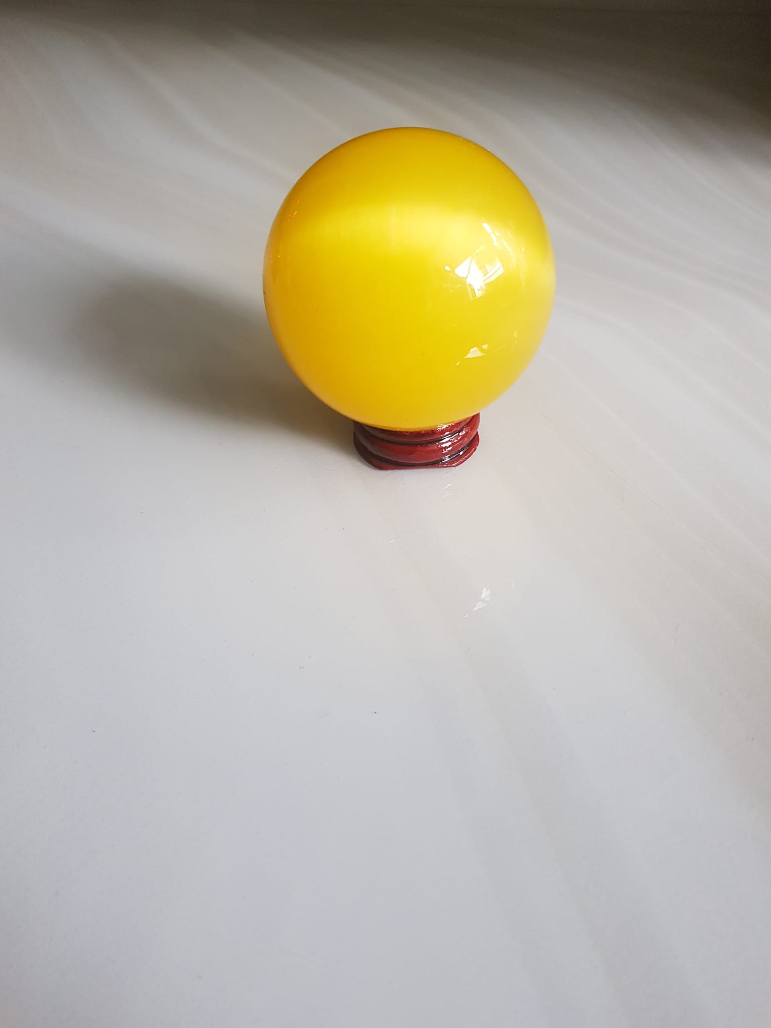 Trái Bi VÀNG ANH TƯƠI nhỏ vừa đá mắt mèo ánh cao 8cm x đk 6cm đế gỗ may mắn để bàn làm việc may mắn tài lộc hợp mệnh KIM, mệnh thổ, mệnh THỦY ạ