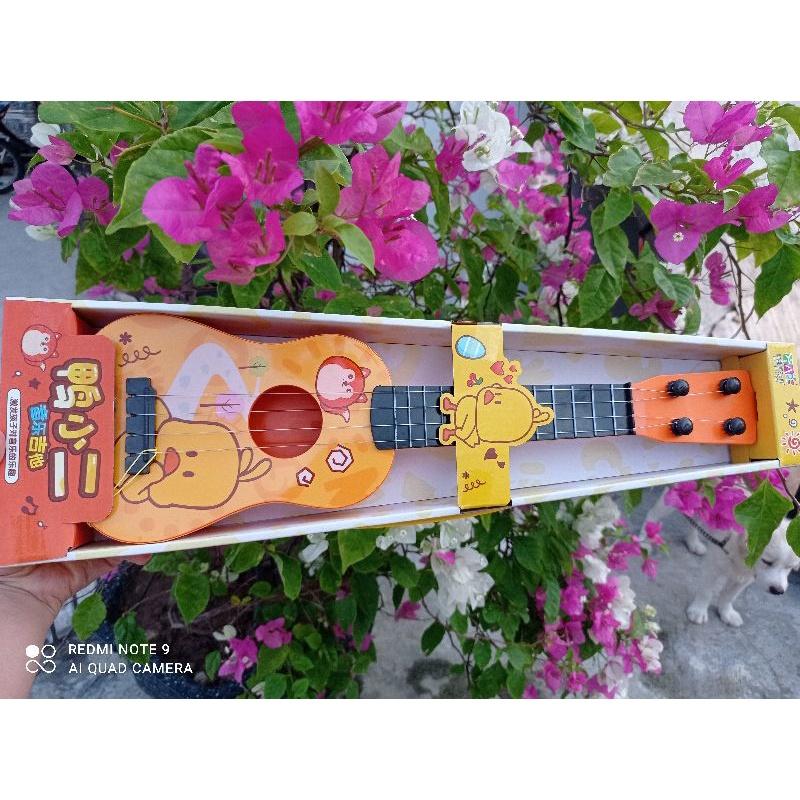 Đàn Guitar Mini Đa Màu Sắc Kích Thích Sự Vui Chơi Của Bé Với Âm Nhạc. Đàn ghita vui nhộn cho bé