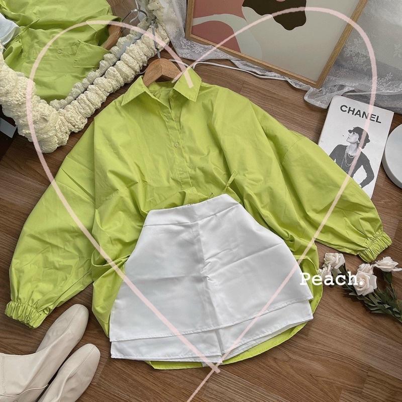 Set áo sơmi xanh tay bo tà lệch phối quần short trắng
