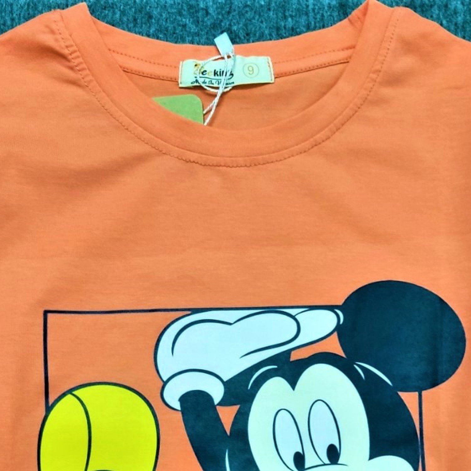 G0314 Áo thun croptop Mickey màu cam cho bé gái