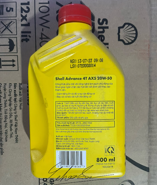 Shell ax5 20w-50. 800ml . Shell vàng cho xe chở nặng (chuyên shipper giao hàng)