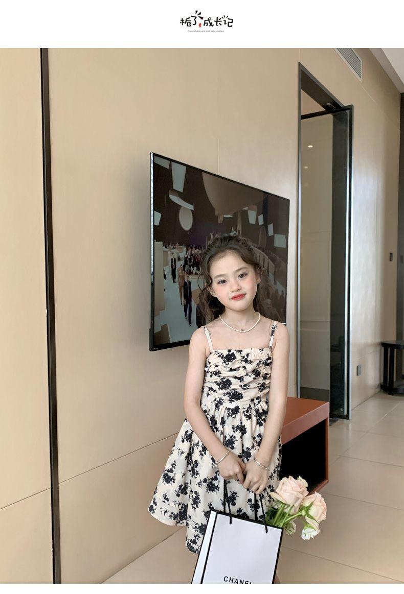 SHUANGYAN Yuanbaoth trẻ em ăn mặc thời trang phù hợp với phong cách phương Tây mùa xuân ăn mặc trẻ em gái mảnh hoa sling váy dệt kim áo choàng