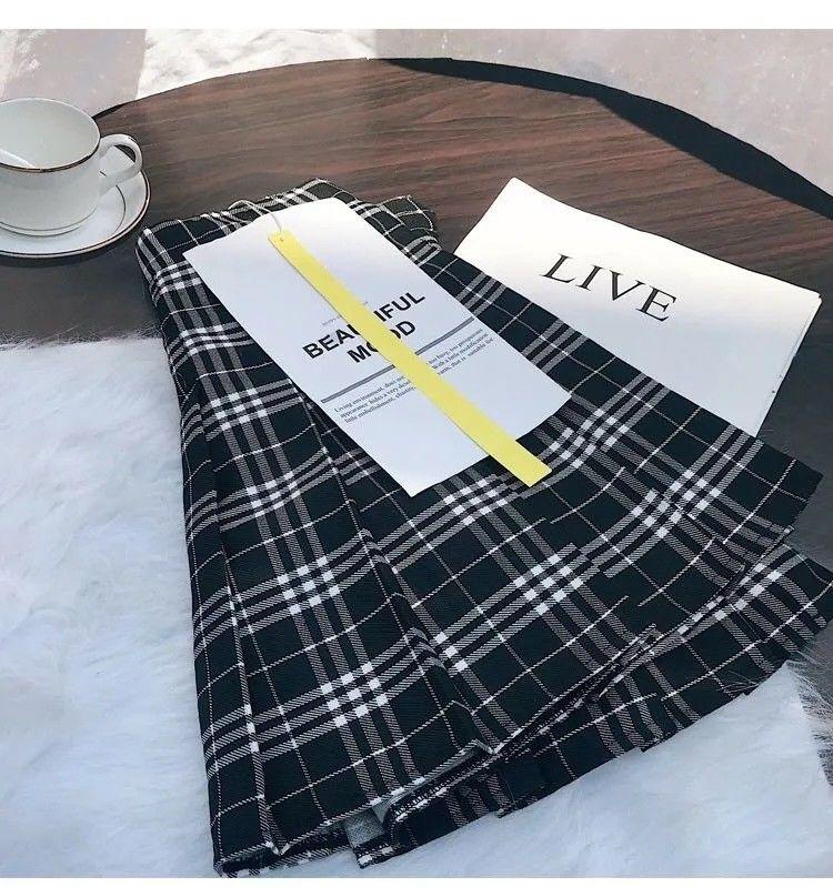 DONGSHOP Váy xếp nếp kẻ sọc nữ xuân hạ nửa người váy cao eo 2023 Hàn Quốc sinh viên chữ A nửa người váy ngắn