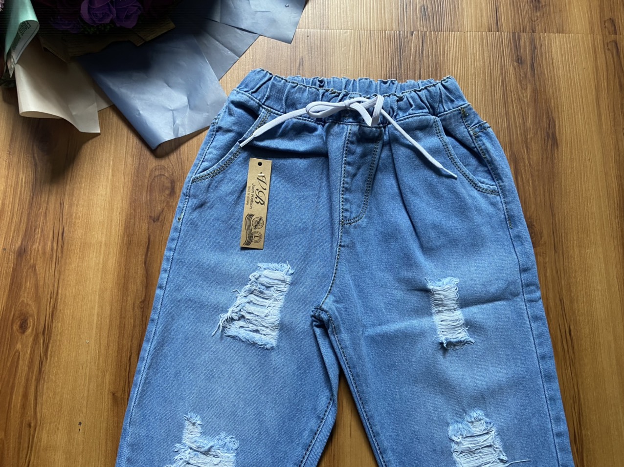 Quần Baggy Jean Nữ Lưng Thun Mẫu Rách Bo Chun Lai