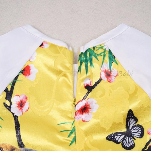 Áo dài cách tân bé gái kèm mấn xinh