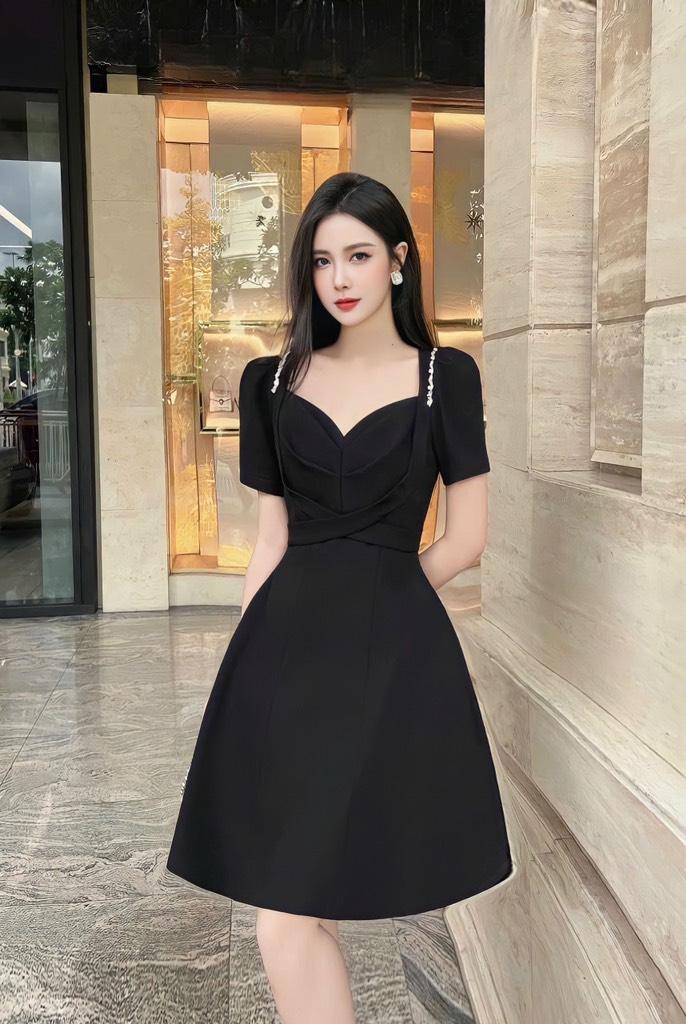 Đầm xòe tay phồng viền đá chéo eo