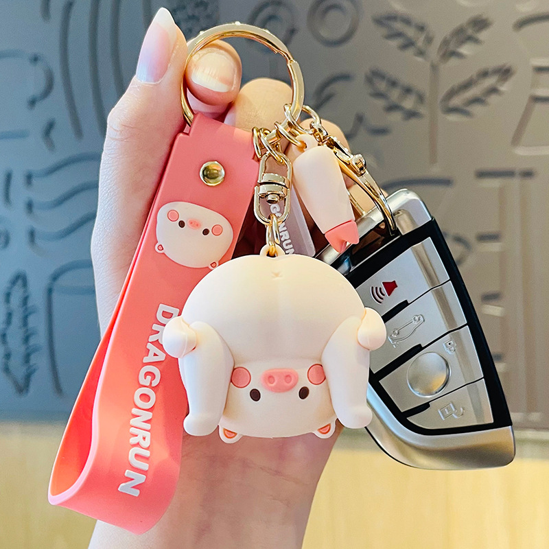 Móc khóa hình con Heo đi xe siêu cute để treo móc khóa oto, xe máy, túi xách, cặp sách, balo bền, đẹp, giá hợp lý