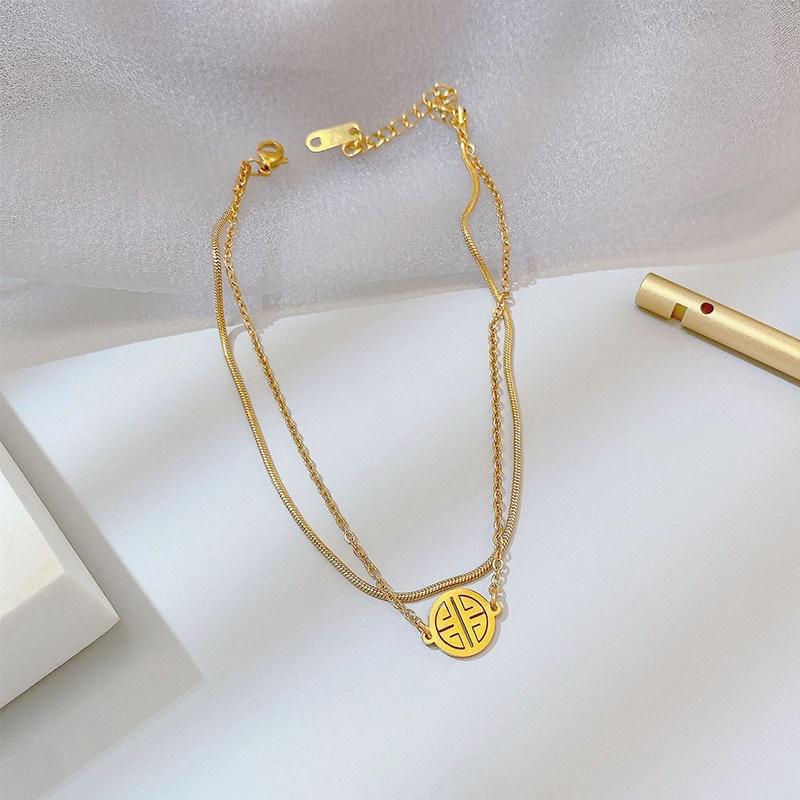 Lắc chân vòng chân nữ titan không đen mặt tròn phúc Ring house