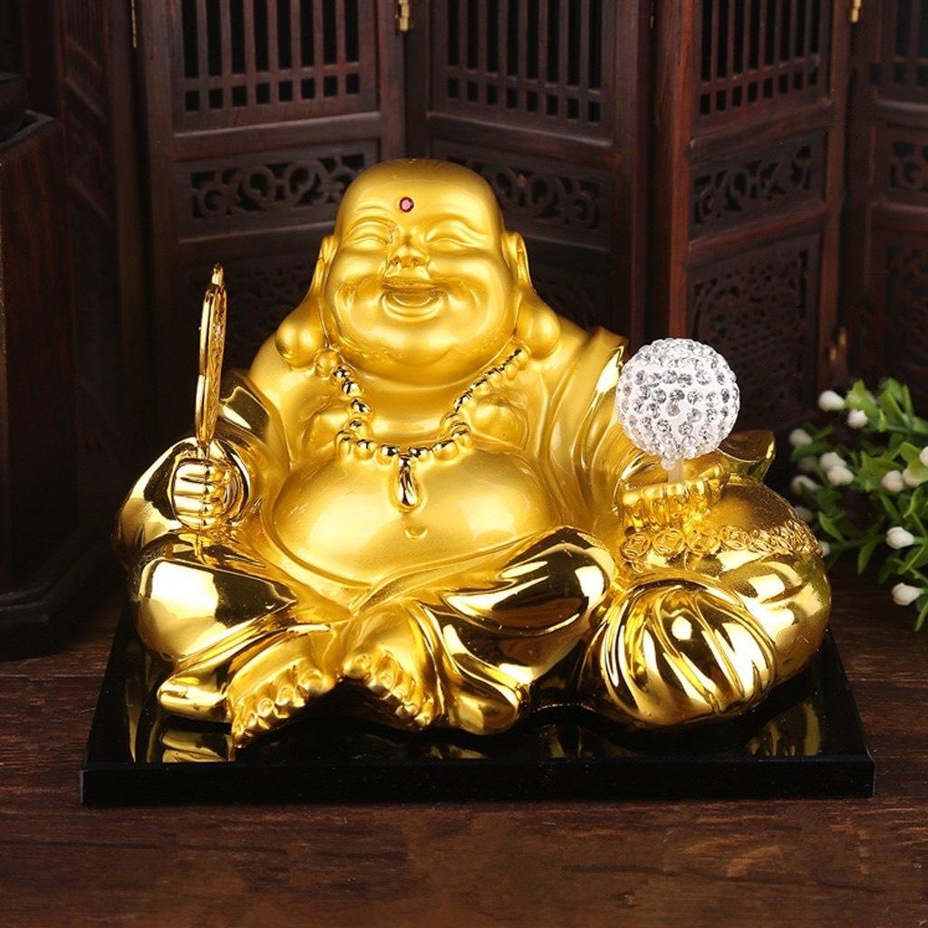 Tượng phật ông di lặc đặt taplo trang trí ô tô xe hơi có quả cầu tự xoay bằng năng lượng mặt trời