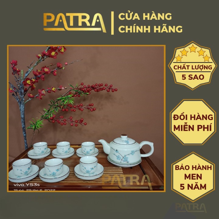 Bộ ấm chén uống trà cao cấp , bộ ấm trà Bát Tràng men kem họa tiết cành đào xanh