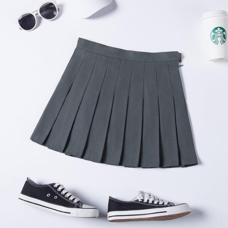 SHUANGYAN Váy xếp nếp nữ xuân hạ váy ngắn màu đen âu phục sinh viên ngắn eo cao chữ A lộ ra gầy nửa người váy