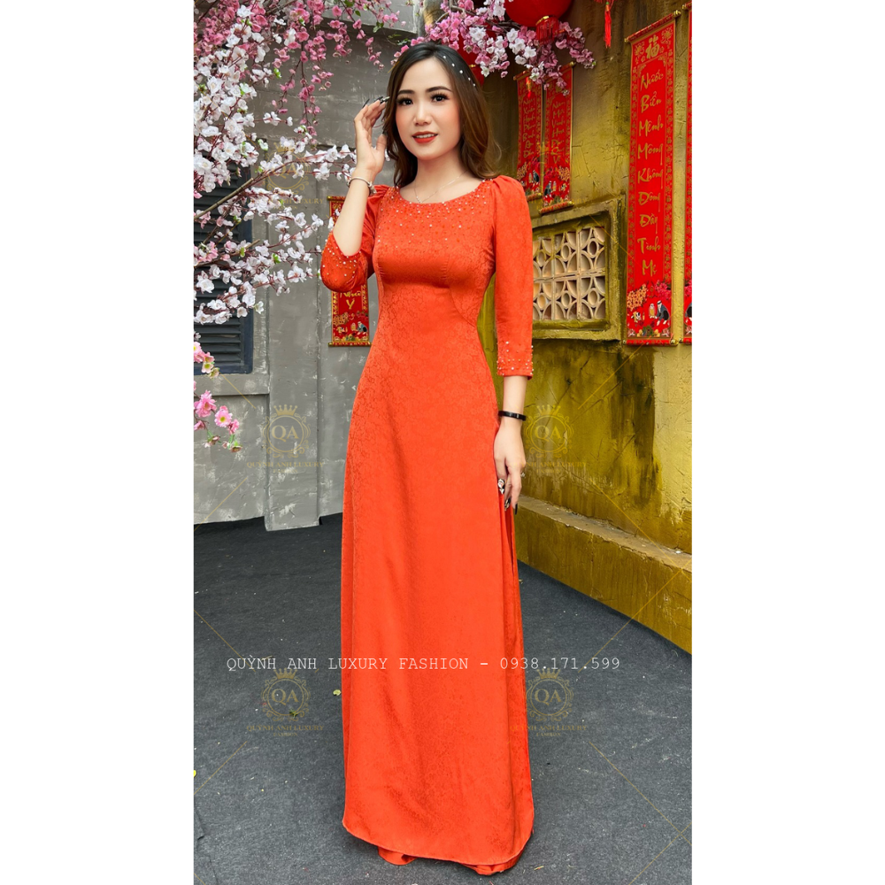 Áo Dài Cam Truyền Thống Gấm Hoàng Gia Cổ Tròn Tay Lỡ Cao Cấp Kora Dress