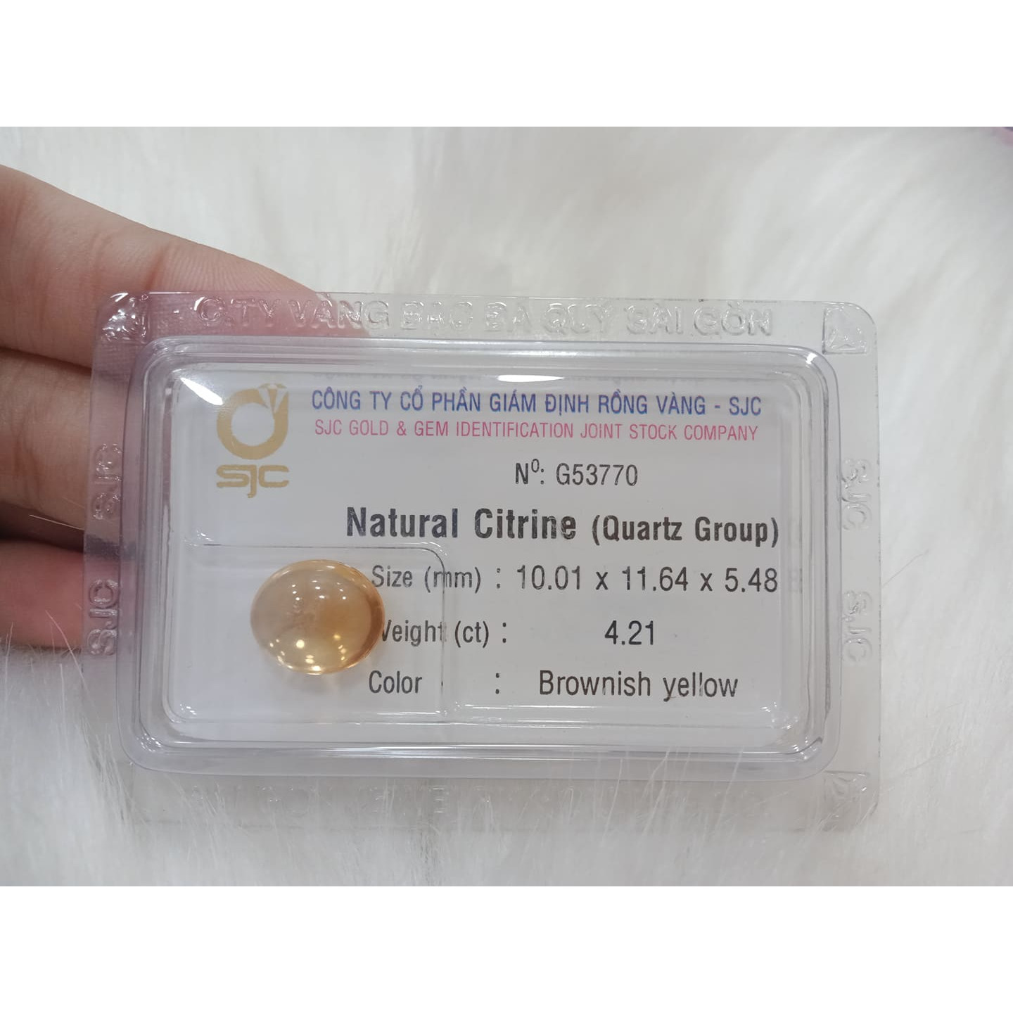 Viên citrine thạch anh vàng oval mài láng 4.21ct 53770