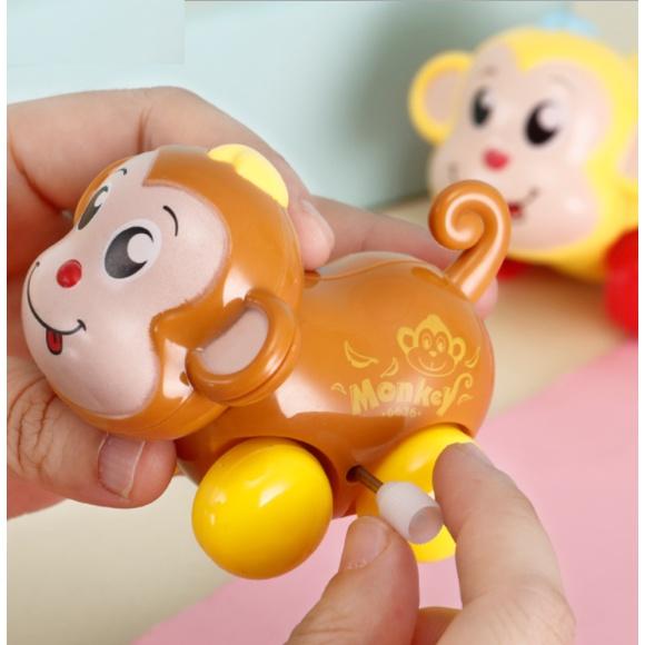 Đồ chơi xe con lên dây cót hình chú khỉ đáng yêu cho bé
